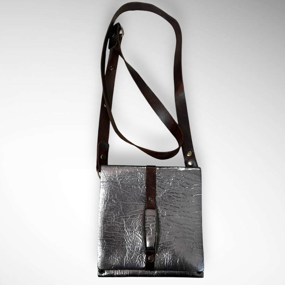 REBEL DESIGNS Unique‎ Leather Metallic Crossbody Bag With Eyelet Detailing | EUC